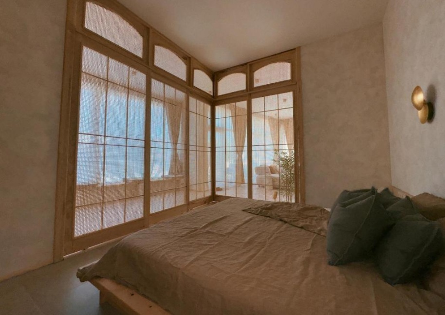 Bedroom with rattan sliding doors