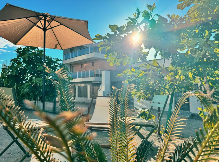 Private garden with terrace and outdoor furniture