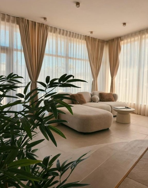 Living room with linen curtains and soft light